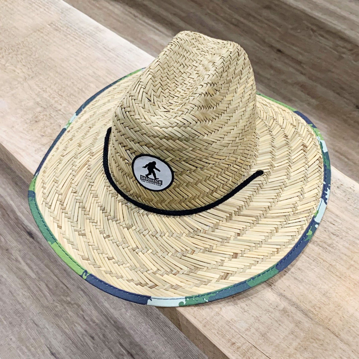 Straw Sun Hat with a Sasquatch The Legend Patch on the front